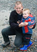 Andrew Stickland with his son, James
