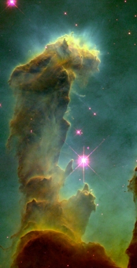 The Eagle 
Nebula. Image courtesy <a href='http://nix.larc.nasa.gov/info;jsessionid=gf2djk2lb49w?id=GPN-2000-000987&orgid=12'>NASA.</a>